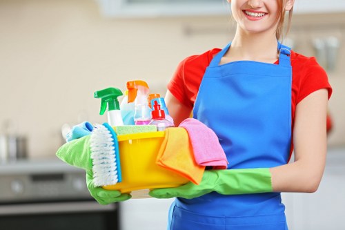 Cleaner wearing PPE while carrying out carpet cleaning in Shepherds Bush