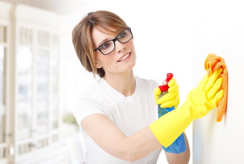 Carpet cleaning team following safety procedures indoors